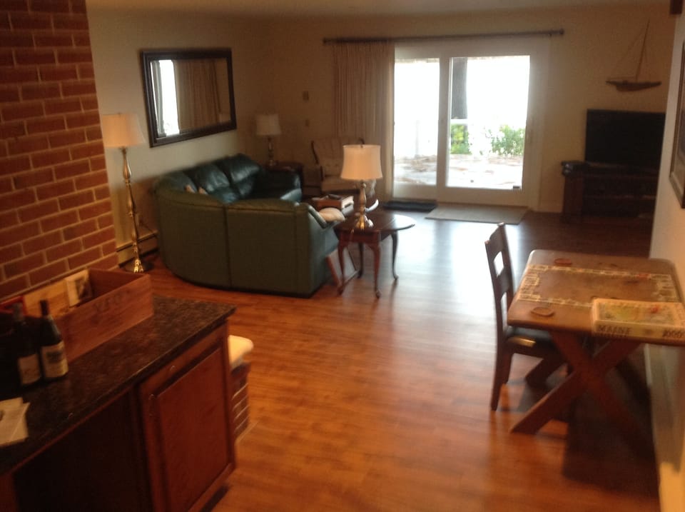 Living room looking out onto the deck and lake.