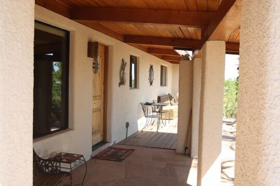 Front Entry with Redwood Deck overlooking Koi Pond 