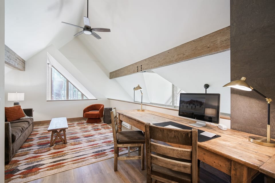 Loft with Queen sleeper and lounge chair.  A great place to escape!