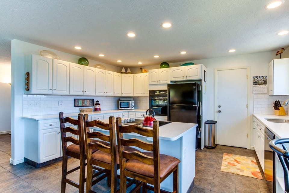 The modern kitchen has every modern appliance you might imagine.