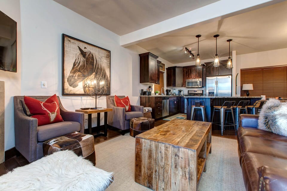 Vacation Rentals in Park City at Bear Hollow Ridge 2308: Living room with gas fireplace and private balcony access