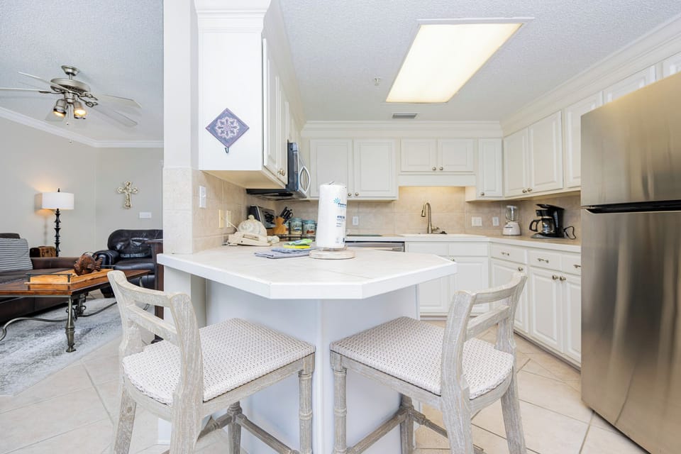 Sit at the cozy bar stools and enjoy your morning coffee while taking in the inviting kitchen atmosphere