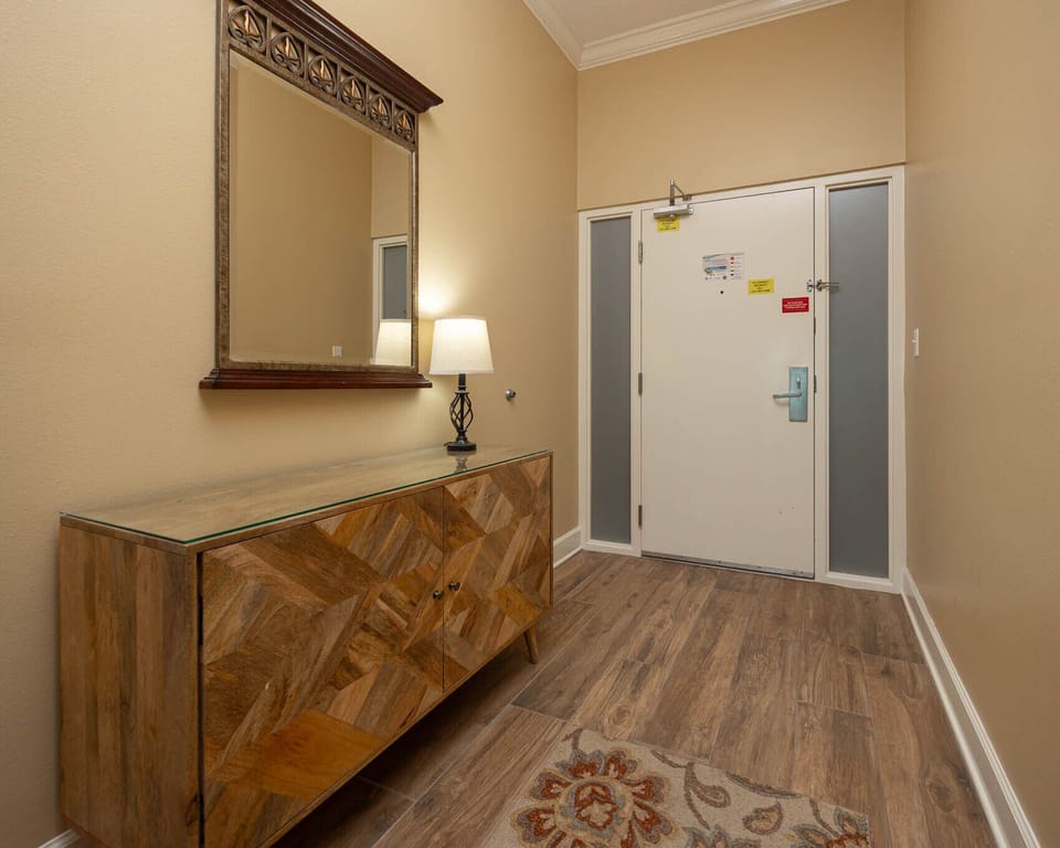 Step into a warm welcome, admiring the stylish decor as you prepare for your coastal getaway