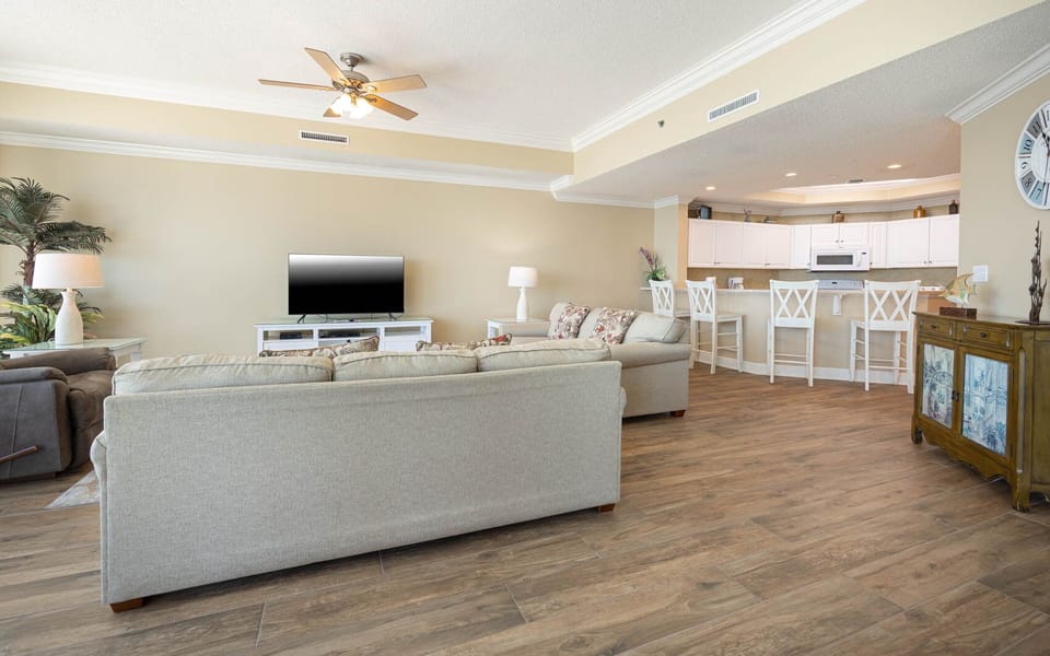 Unwind on the plush seating, streaming your favorite shows, while enjoying the warm coastal vibe around you