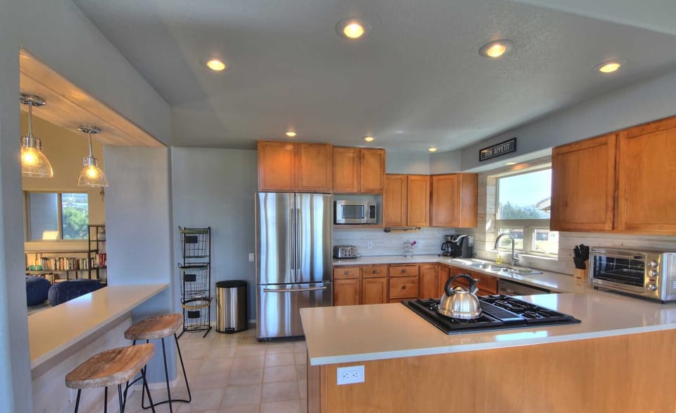 Spacious and well lit, this modern kitchen will elevate your culinary adventures.