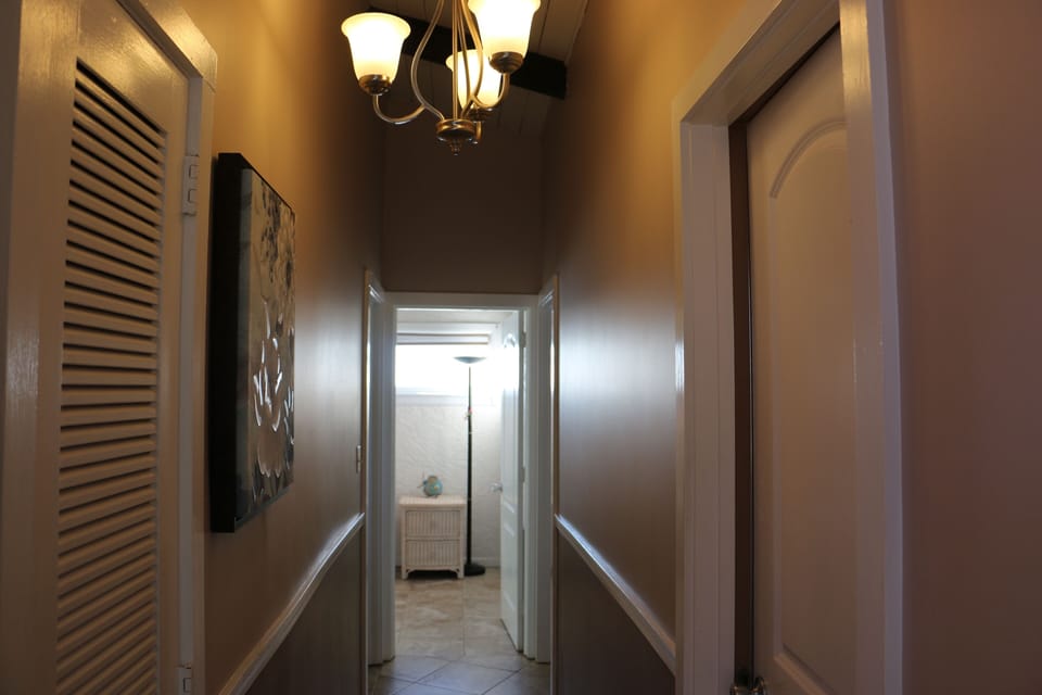 Hallway to bedrooms and bathrooms