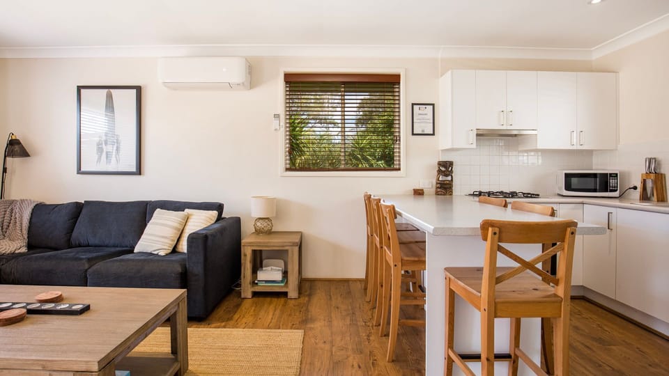 Dining for 6 adjacent to living area.