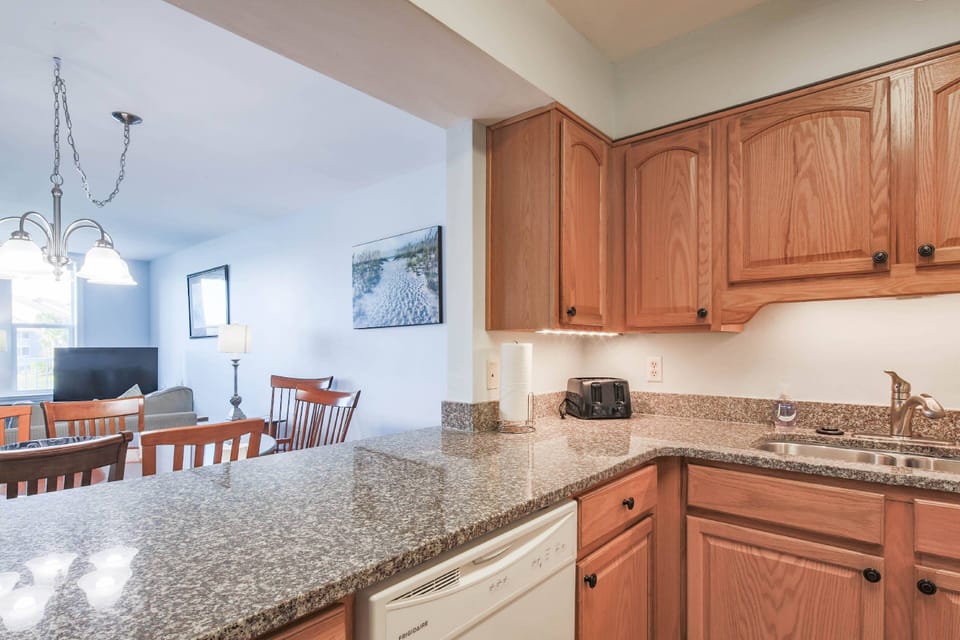 The kitchen overlooks the dining & living room areas.