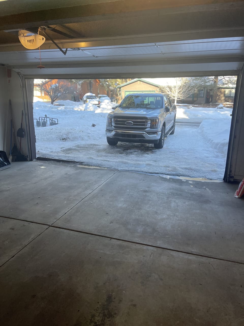 View of street from the 2 car garage 