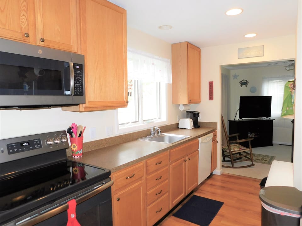 451 D Garfield Pkwy - Kitchen Workspace - Close-up of the kitchen counters highlighting the microwave and coffee maker.