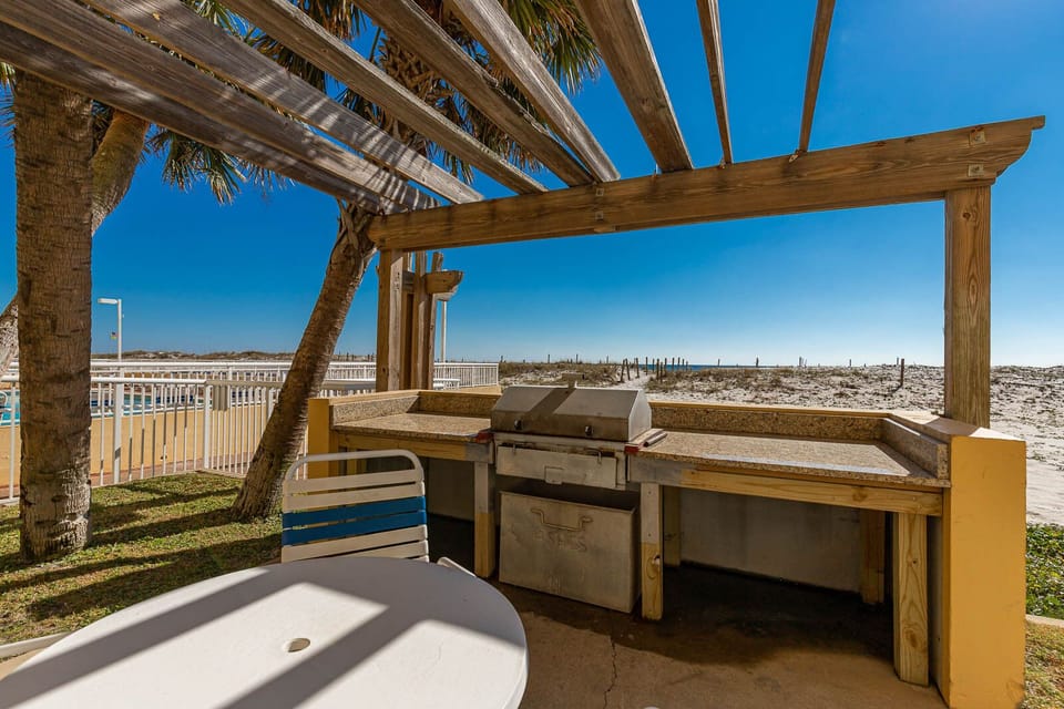 Take a dip in the pool to cool off after a day at the beach on your perfect getaway vacation in Gulf Shores