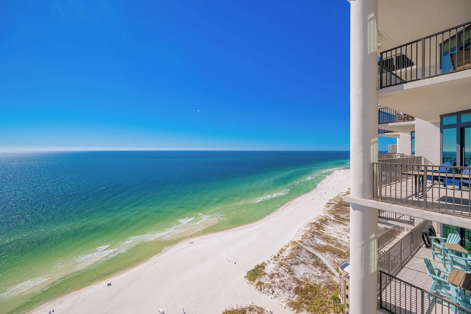 Enjoy breathtaking views from your balcony while soaking in the tranquil sounds of the coast and warm sunshine