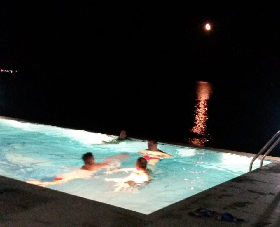 swimming under moon light