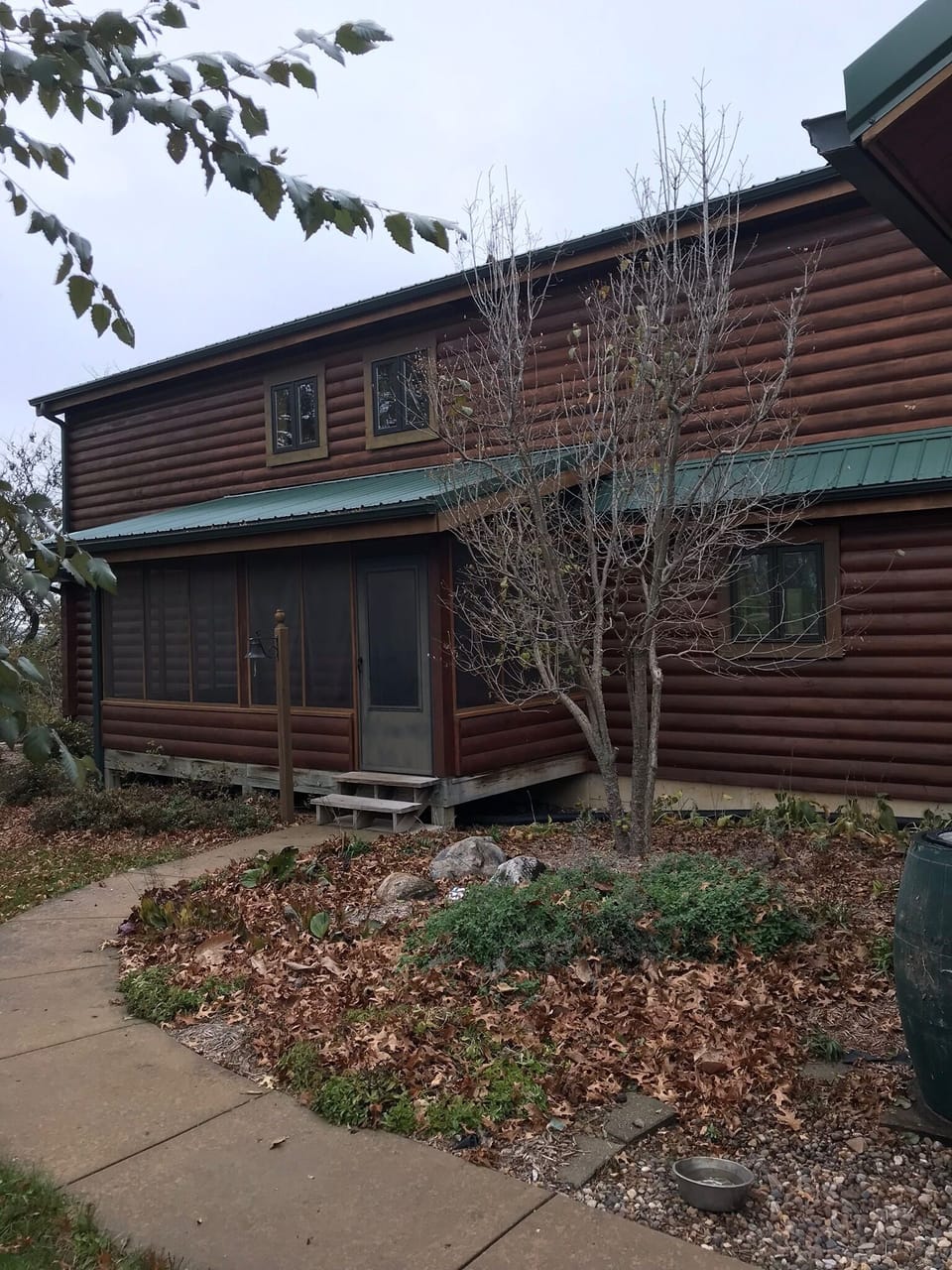 Front of house, screened porch to relax on.