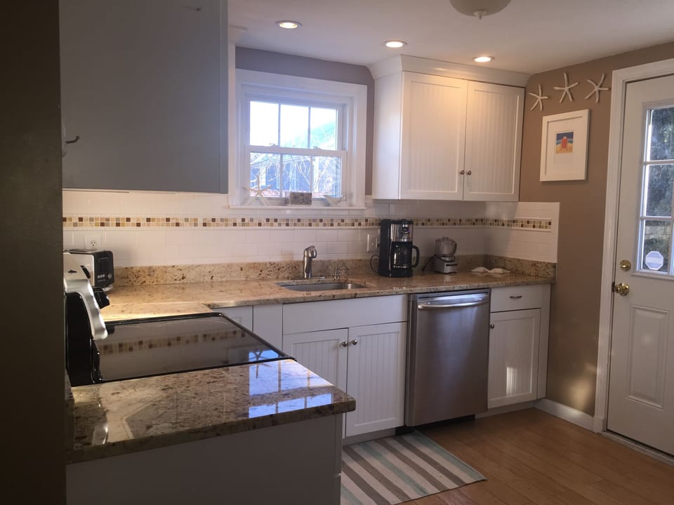 Full Kitchen-Door goes out to large deck.