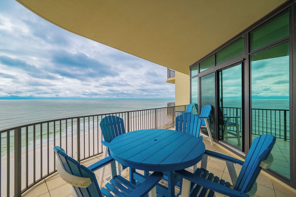Relax in vibrant seating on your balcony, taking in tranquil views of the coast and feeling the gentle breeze