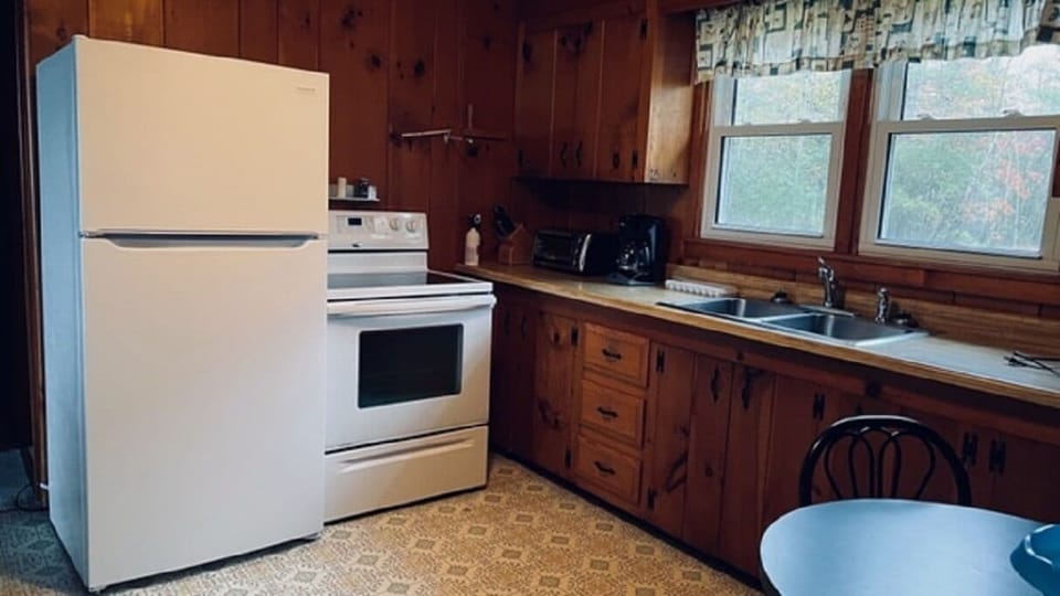 Recently updated refrigerator and flat top stove