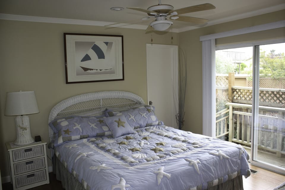 Guest Suite, with sliding glass doors and side path to hot tub