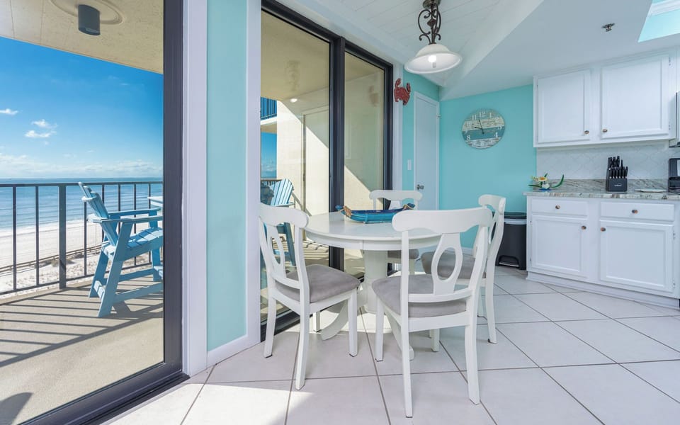 Unwind at your table, sipping morning coffee while enjoying the gentle sounds from your balcony and vibrant coastal views