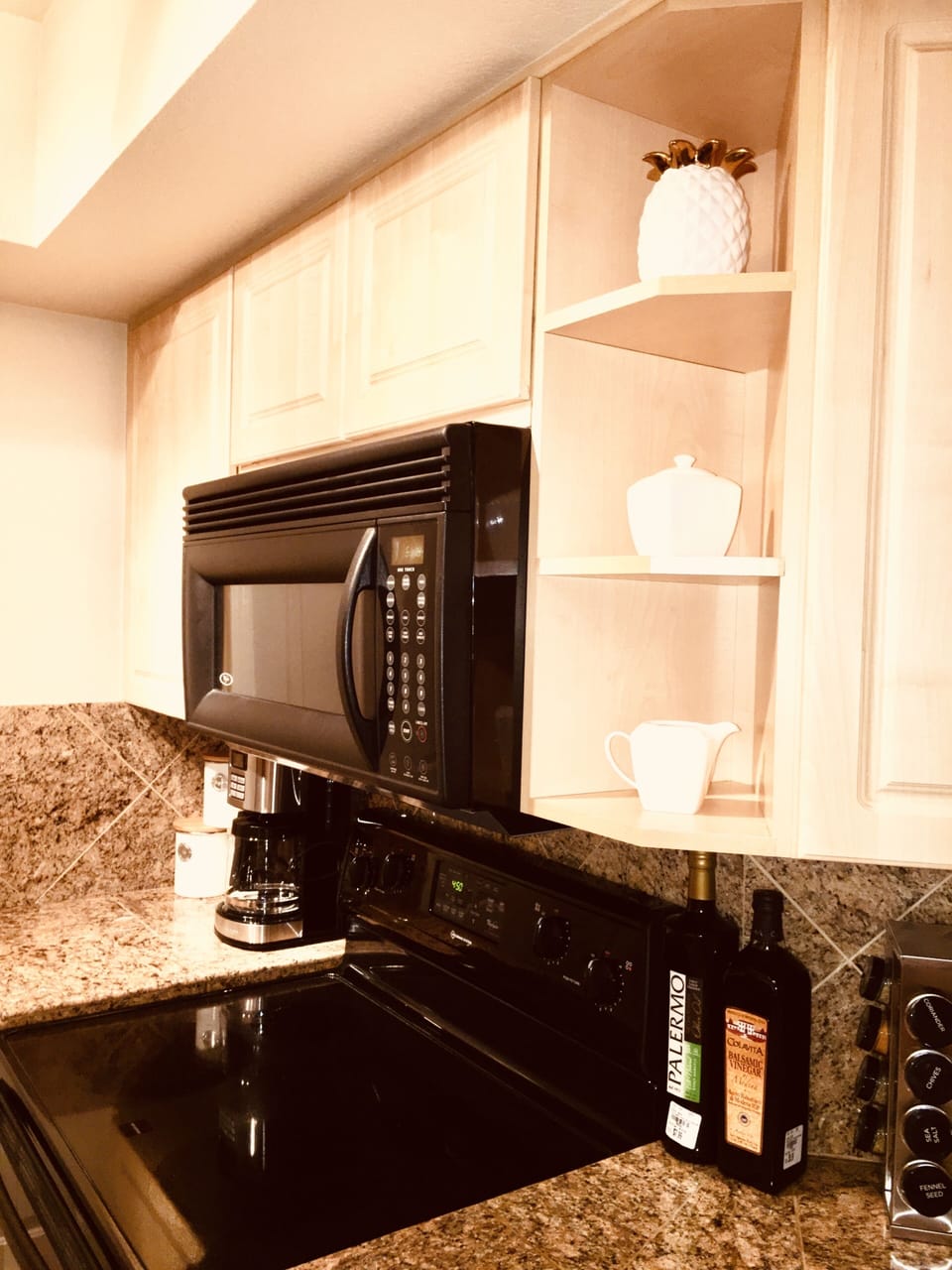 Refrigerator, dishwasher, microwave, range/oven, two coffee makers, blender