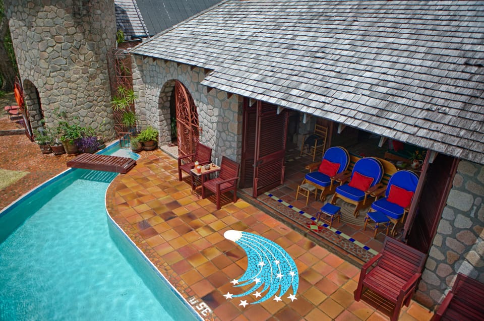 Enjoy morning coffee or tea from the open air living room watching rainbows.