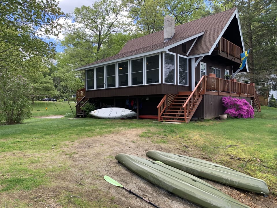 A side view from the beach, showing expansive newly renovated 4 season sunporch.