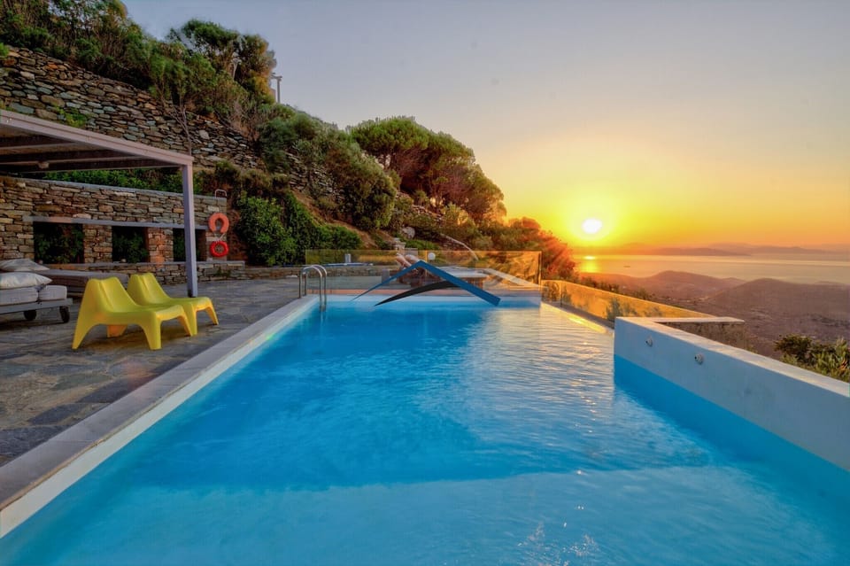 The pool, terrace and the sunset