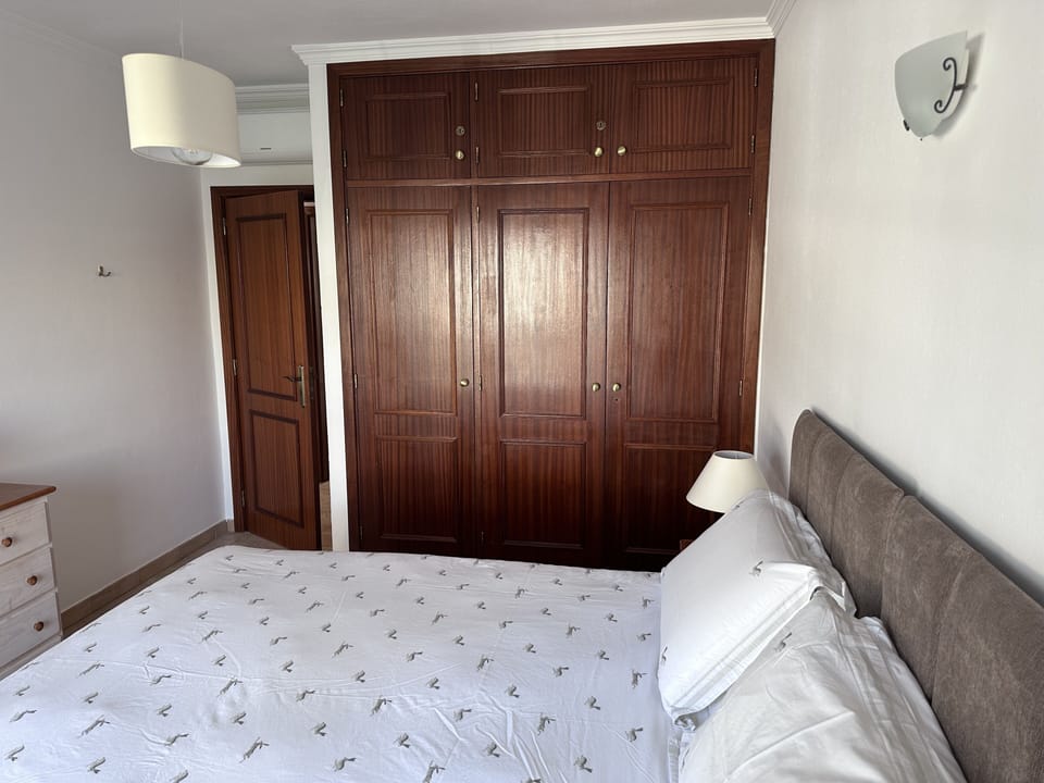 Room 3 - the front bedroom showing the Super king bed and fitted wardrobe 
