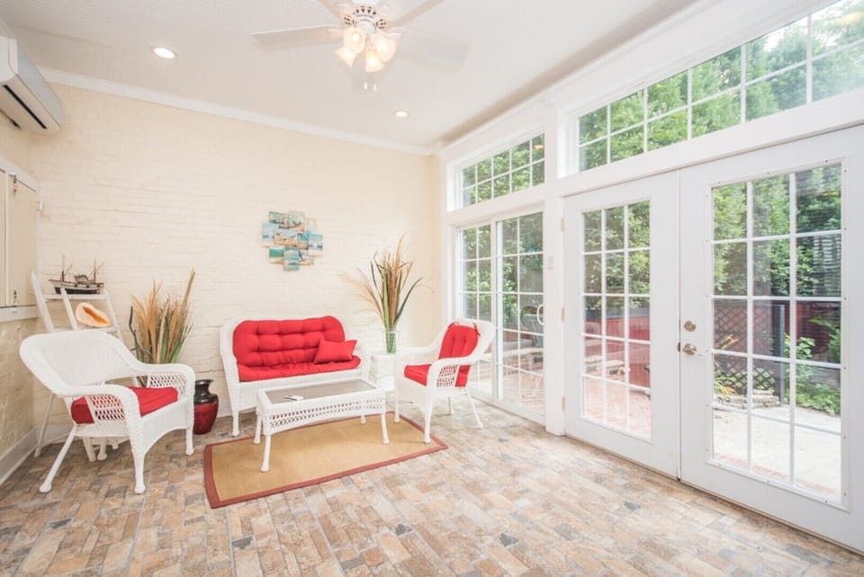 Off the kitchen to the back of the house is a Florida room w/lovely morning light