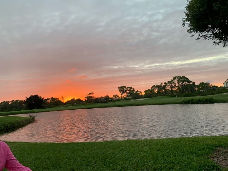 Sunsets overlooking the lake in the back yard.