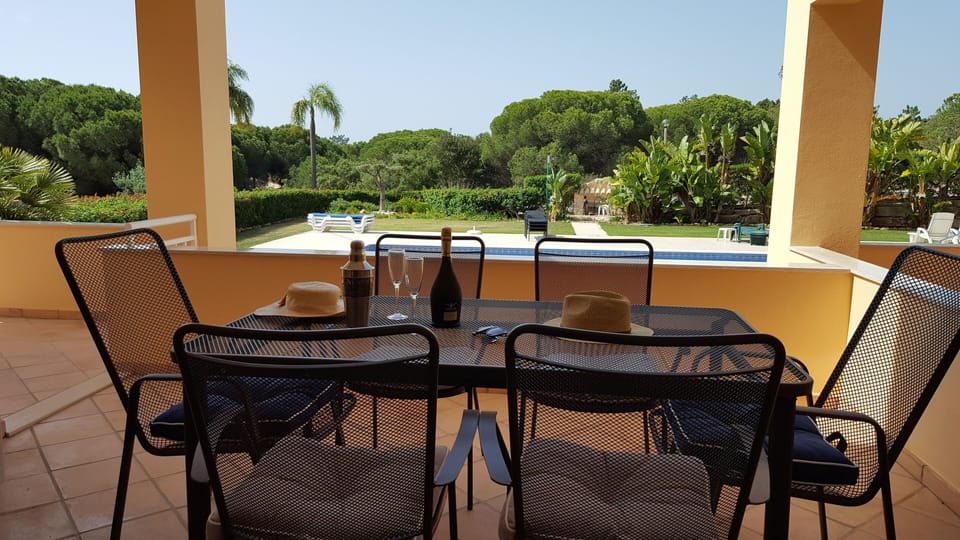 Main terrace with superb elevated views around the gardens & swimming pool area.