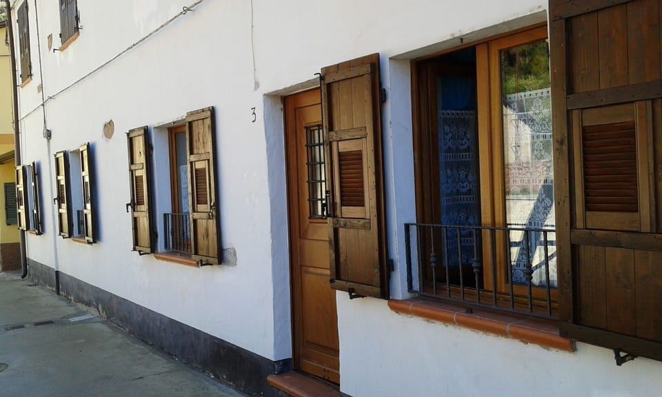 exterior with its wooden shutters.