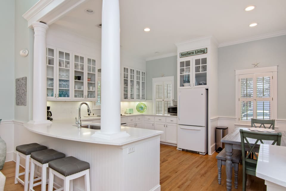 KITCHEN BAR WITH EXTRA SEATING FOR THREE