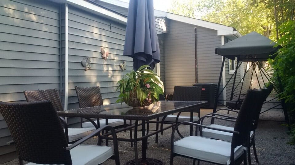 Back Patio and BBQ area, fully stocked with BBQ, Swing Set, Patio Sitting