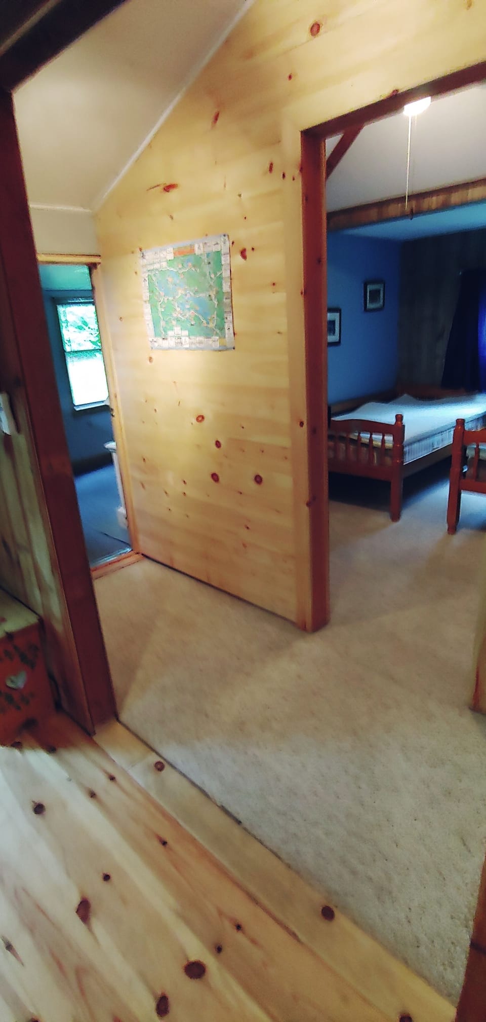 Hall entrance to Bdrm 2 with 2 single beds, closet, dresser