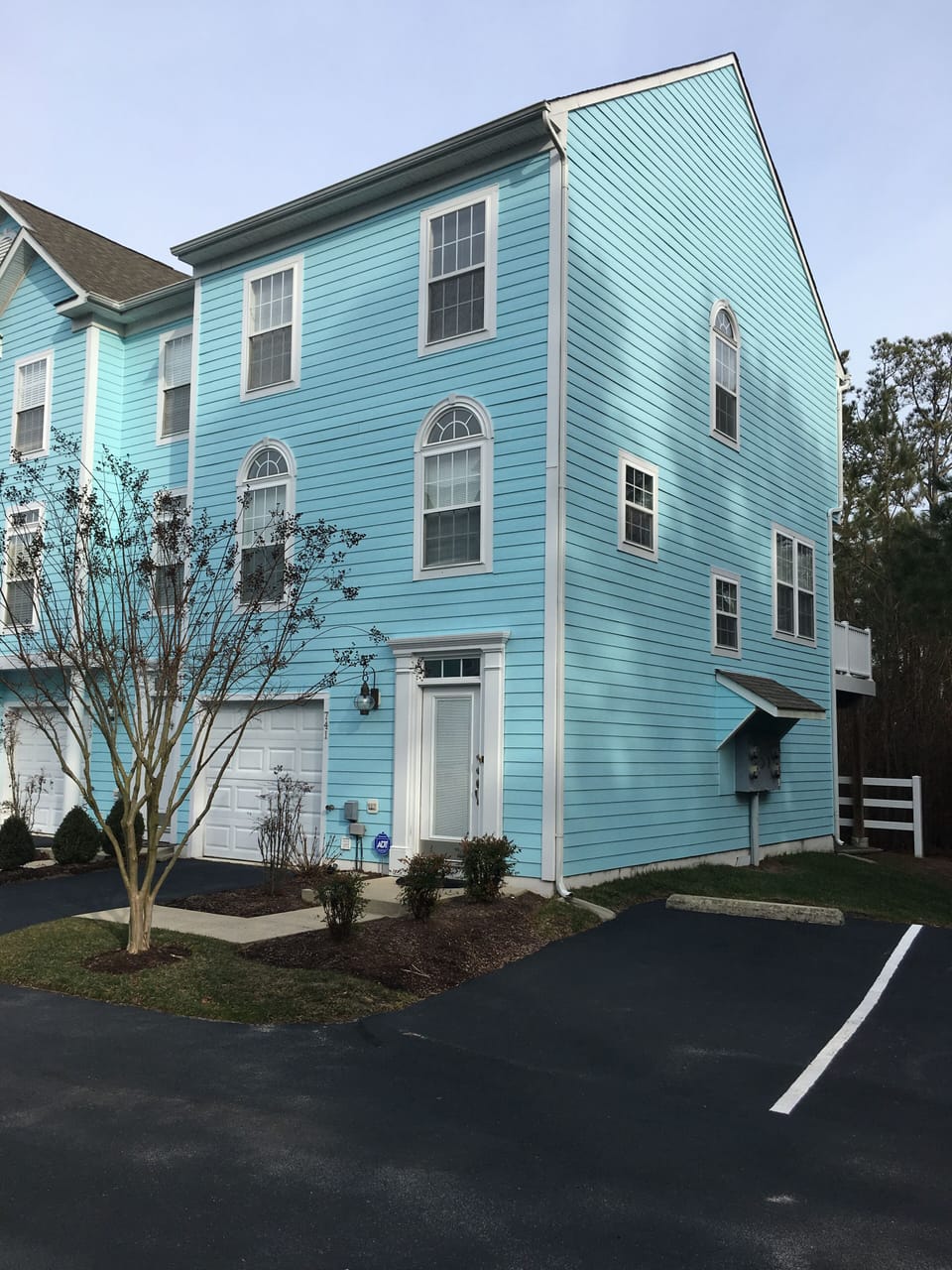 Spacious end unit with back deck & overflow parking right by the front entrance.