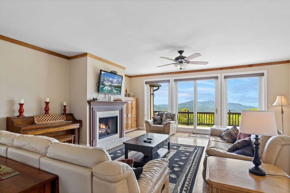 Living area with Fireplace and Deck Access