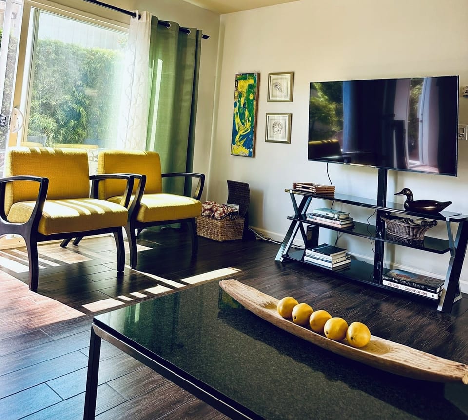 Bright living room opens to patio