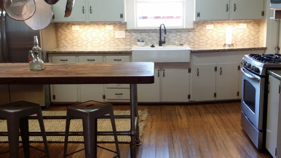 Kitchen has been updated with stainless appliances.