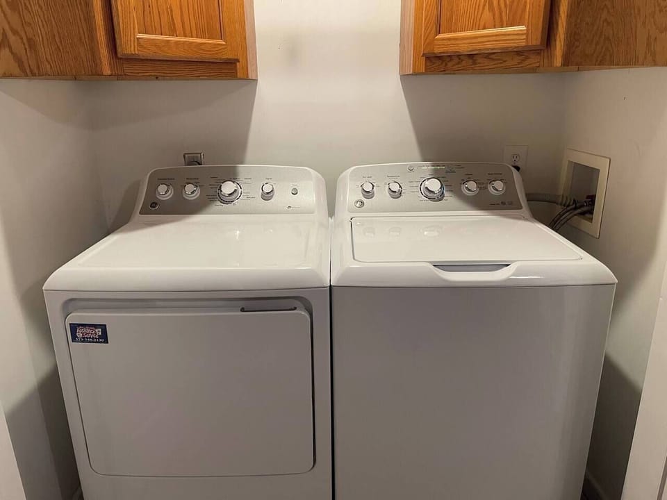 Washer and dryer located in 2nd bedroom closet