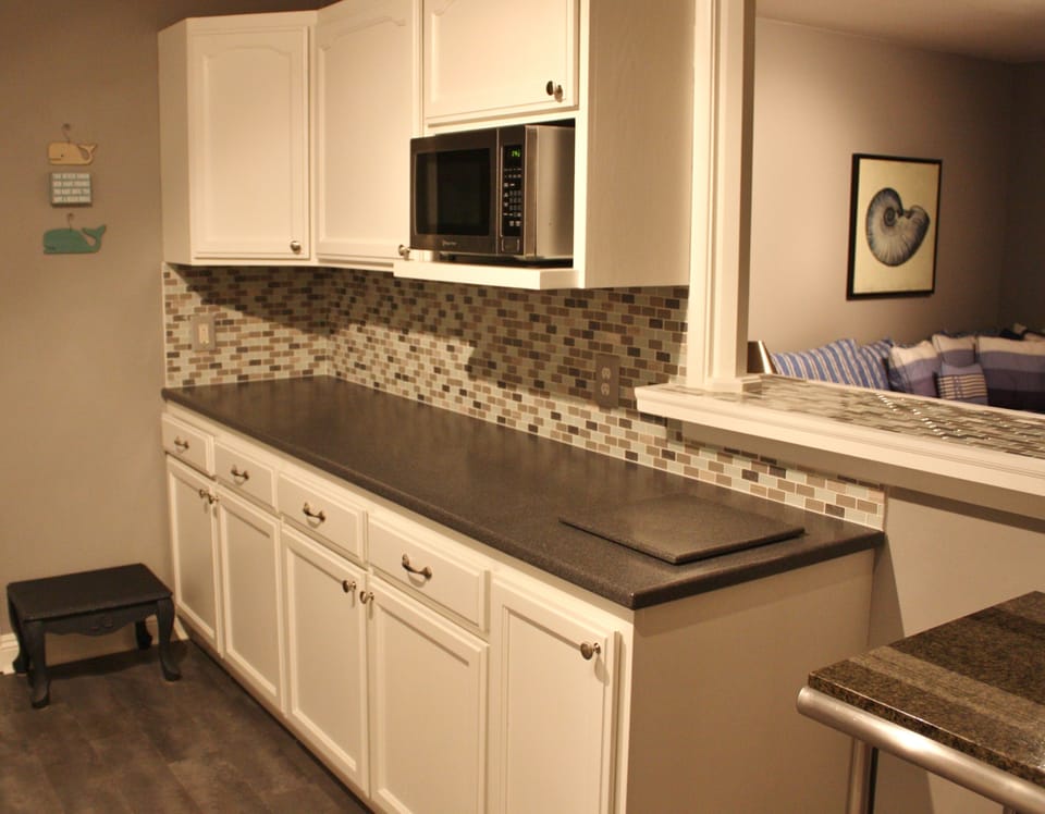 Other side of kitchen with additional  7 feet of counter space plus 4 ft island!