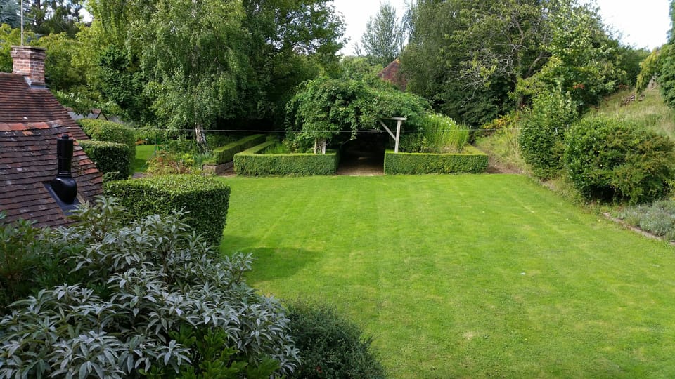 Lawn area outside cottage back door