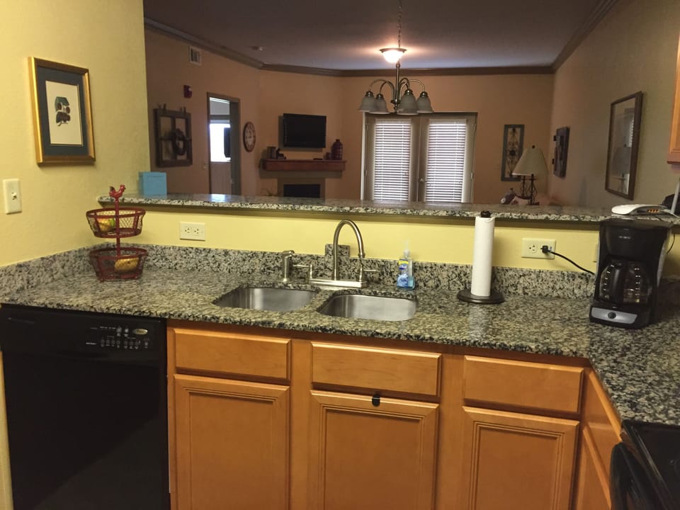A view of the kitchen, dining, and living area.