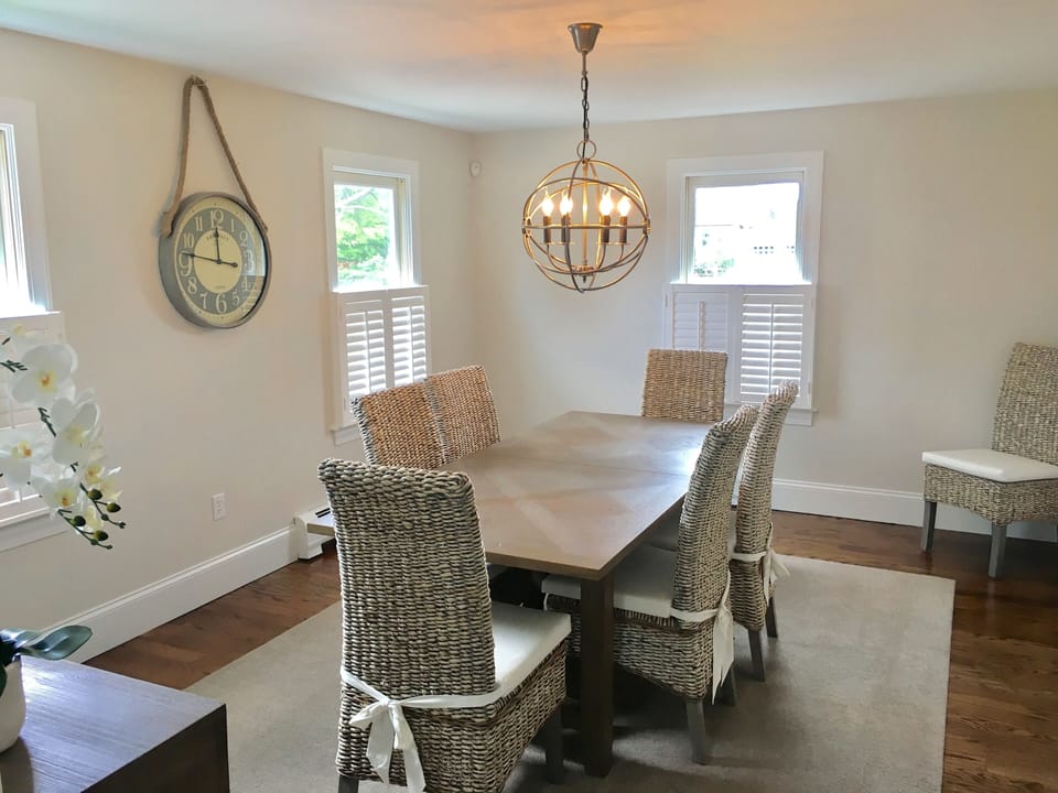Dining room w/seating for 8.  Another table in living room expands & can seat 4.