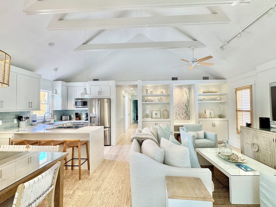 ENTRY VIEW OF RENOVATED FIRST LEVEL W/ HIGH CEILINGS
