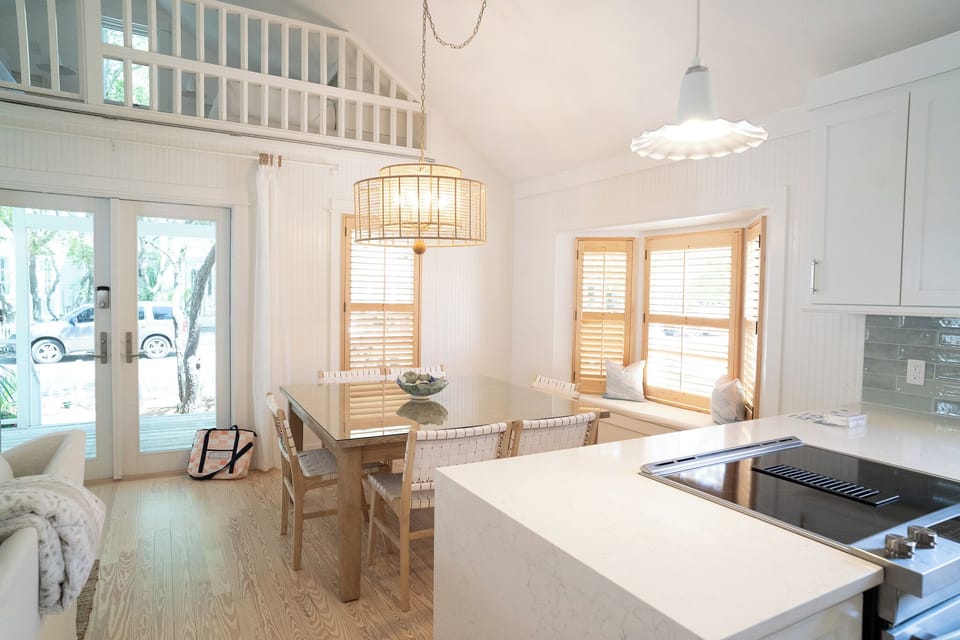 DINING AREA FOR FOUR AND FULLY EQUIPPED KITCHEN ON FIRST LEVEL