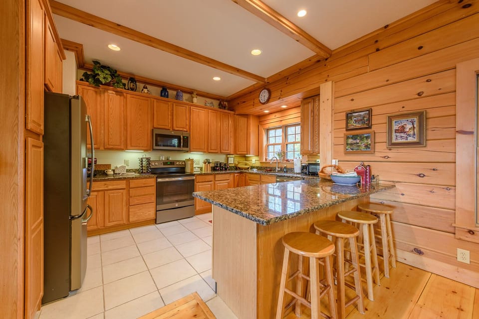 Kitchen with Updated Stainless Steel Appliances, seating at bar