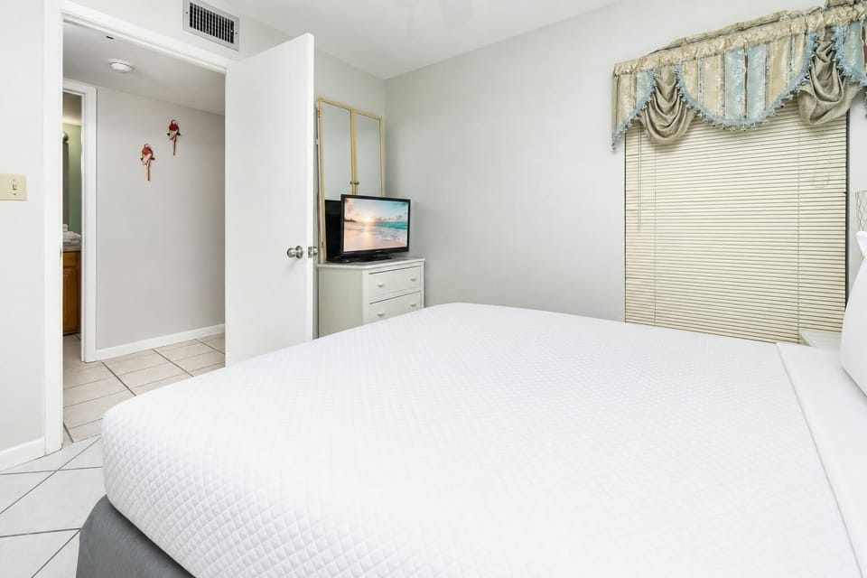 Quiet guest suite with a double bed invites you to unwind while streaming favorites on the TV