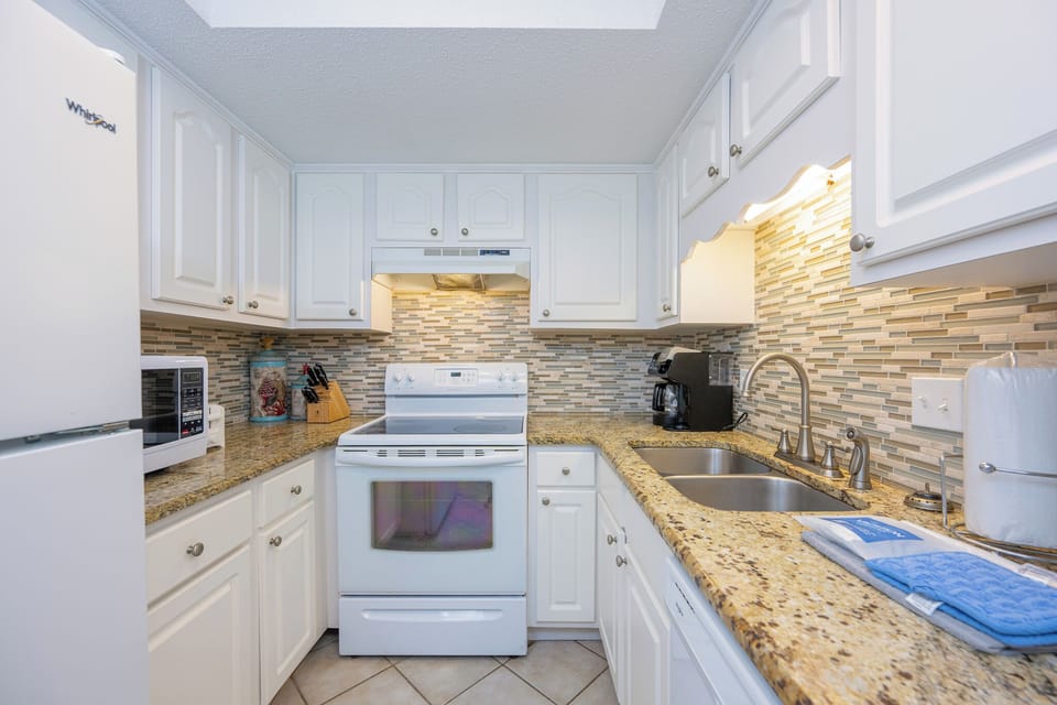 Cook up family favorites in the bright kitchen while enjoying the coastal vibe and fresh scents of your vacation