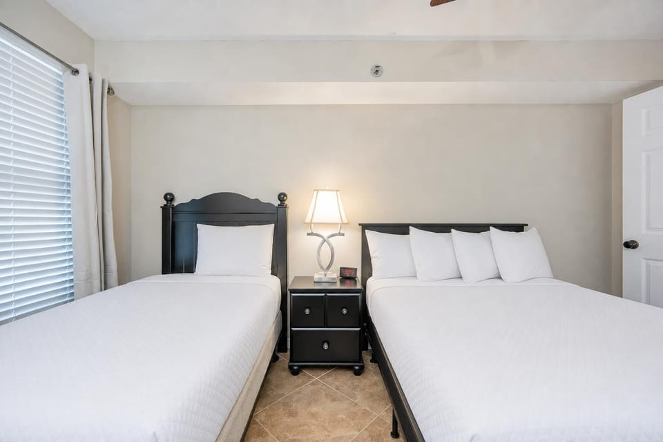 Drift into a restful night on plush beds in the guest suite, perfectly designed for cozy sleeps after beach fun
